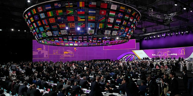 Delegierte nehmen am Donnerstag, 31. März 2022, an der FIFA-Konferenz im Doha Exhibition and Convention Centre in Doha, Katar, teil.